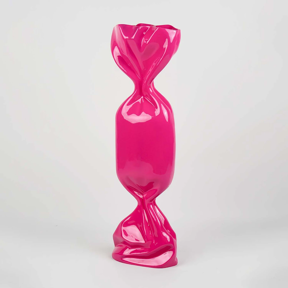 Bonbon décoratif vertical en résine rose brillant