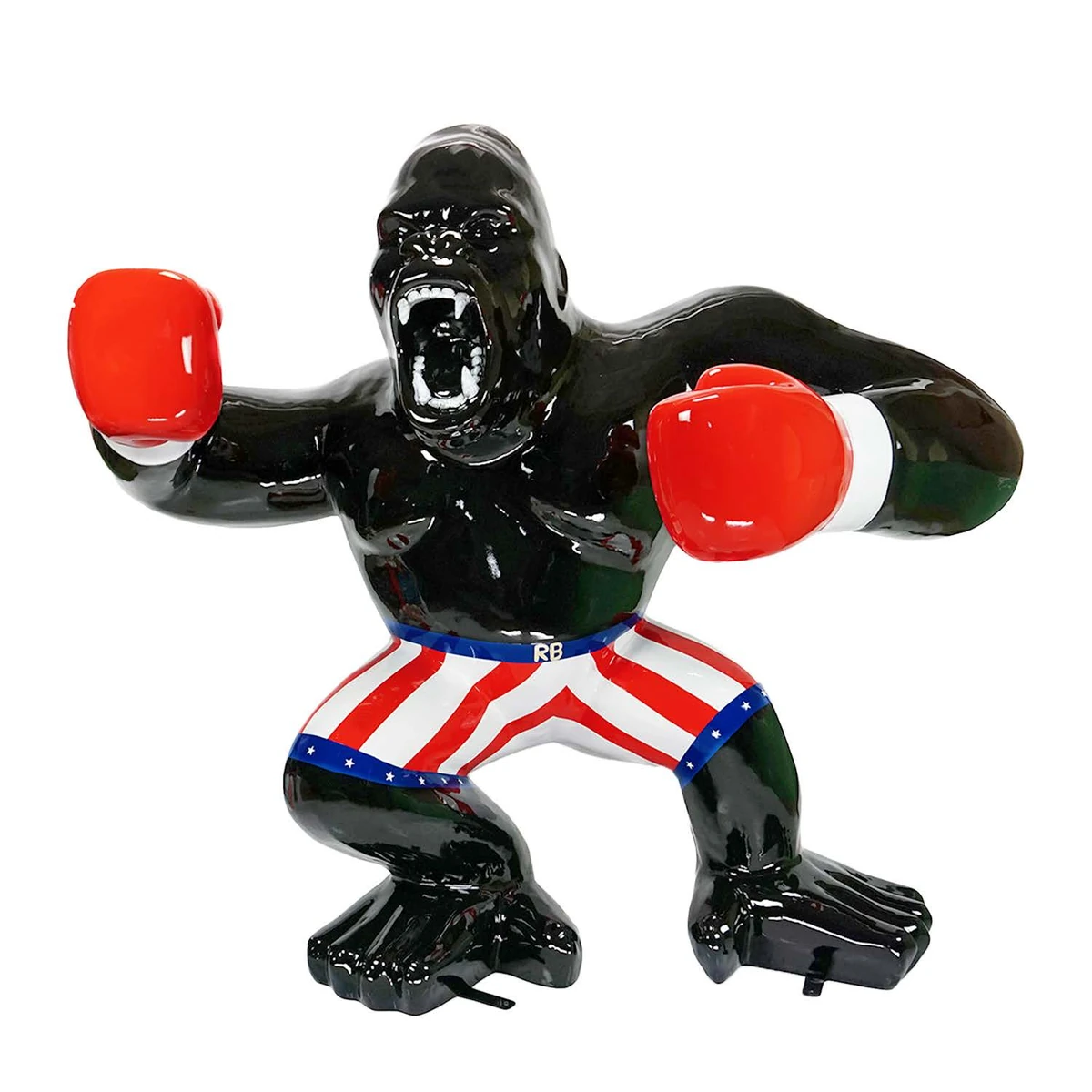 Gorille boxeur noir en résine avec gants rouges et short étoilé